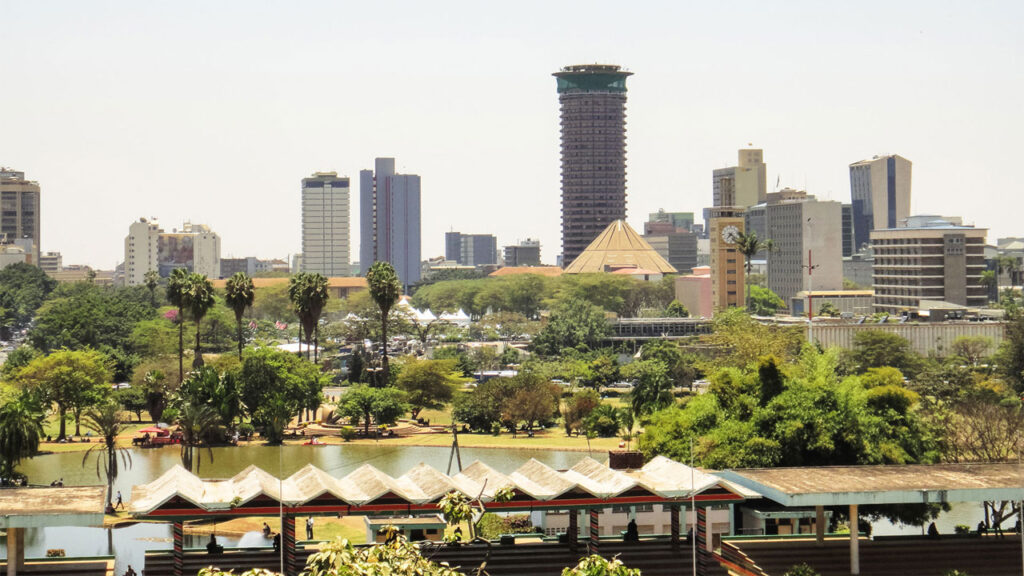 View of the city with pond in the middle and buildings in the background