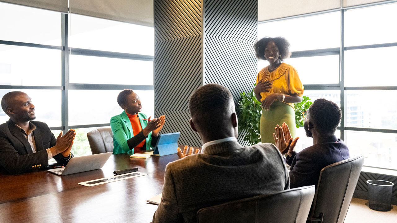 Female entrepreneur leading the business meeting among her male colleagues