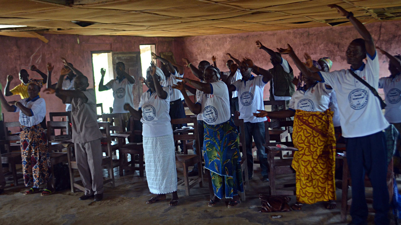 Community members taking part in group exercise