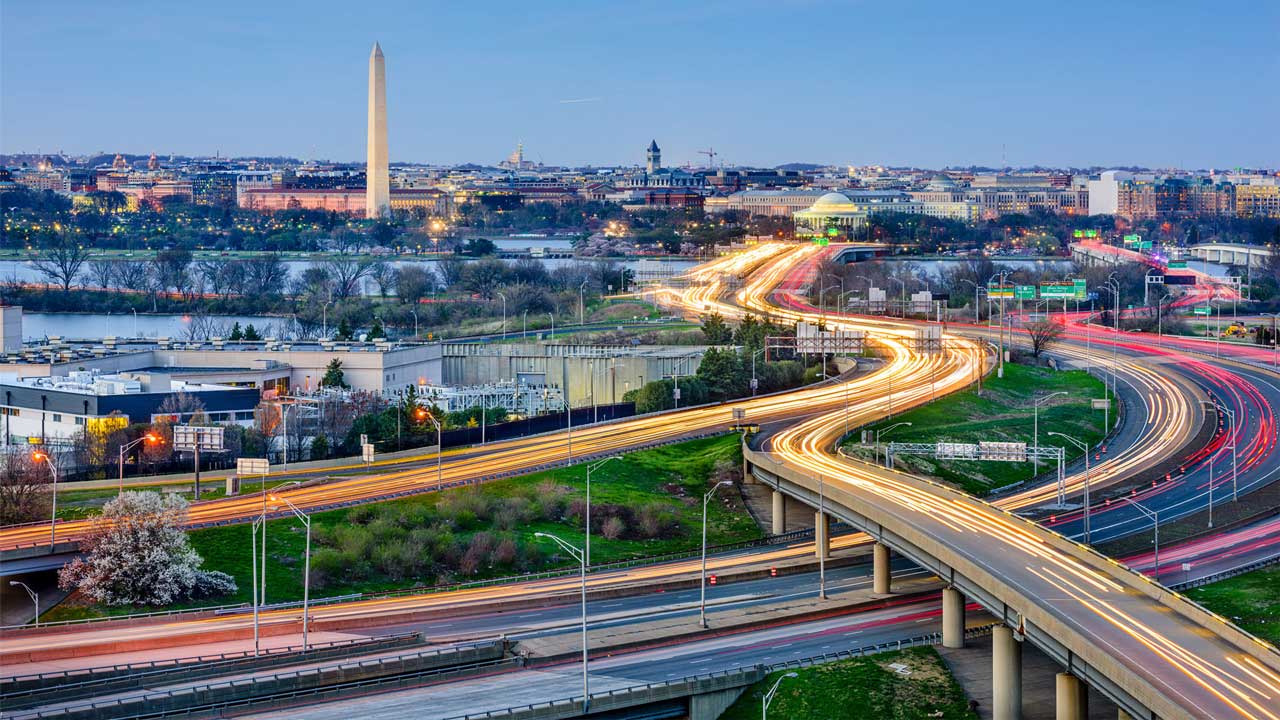 Washington, DC skyline of monuments and highways