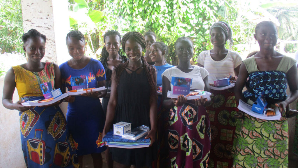 Group of learners showcasing their school supplies