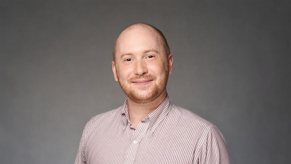 Headshot of Sam Weisman