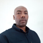 Headshot of Milkias Belay