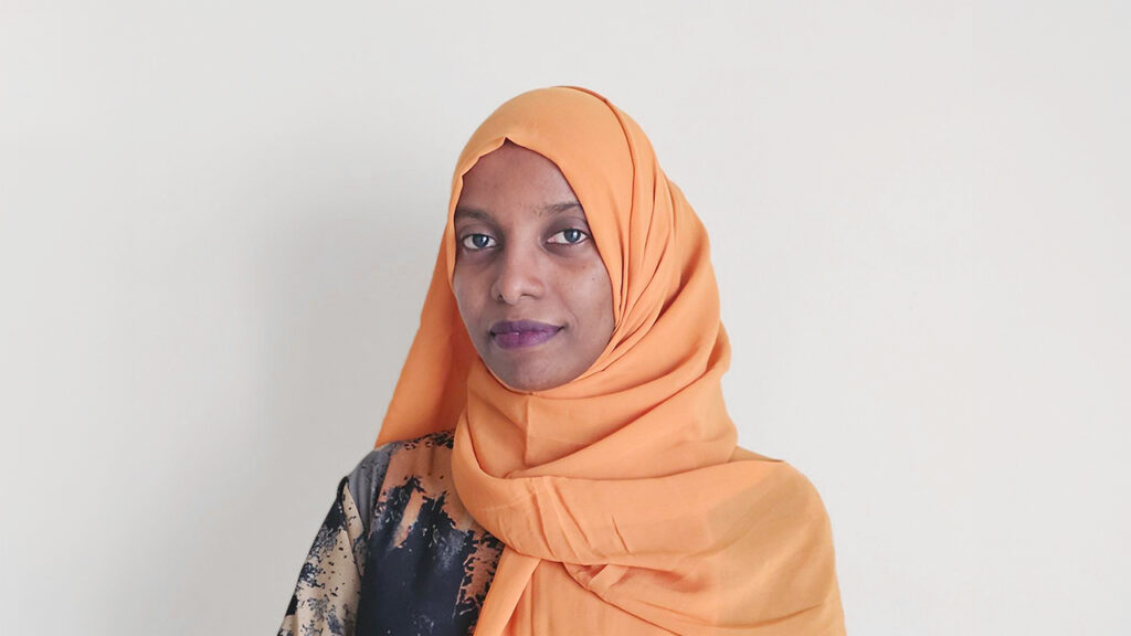 Headshot of Mouna Hassan