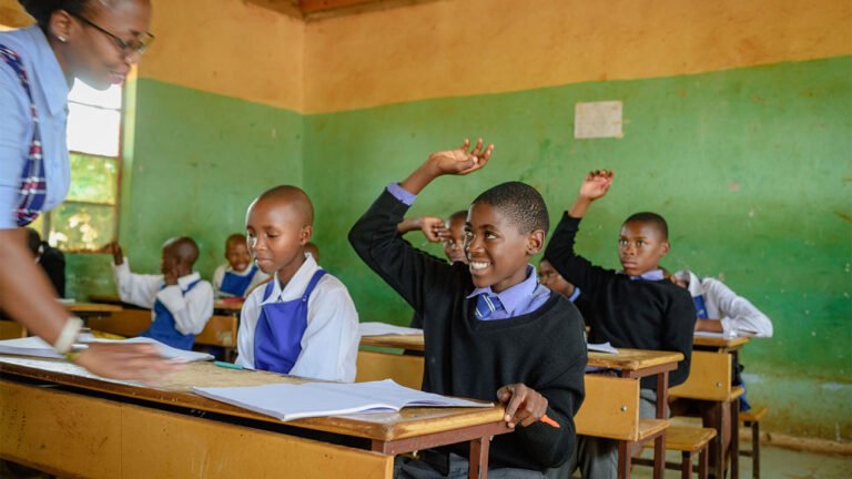 Students enthusiastically engaging in the classroom.